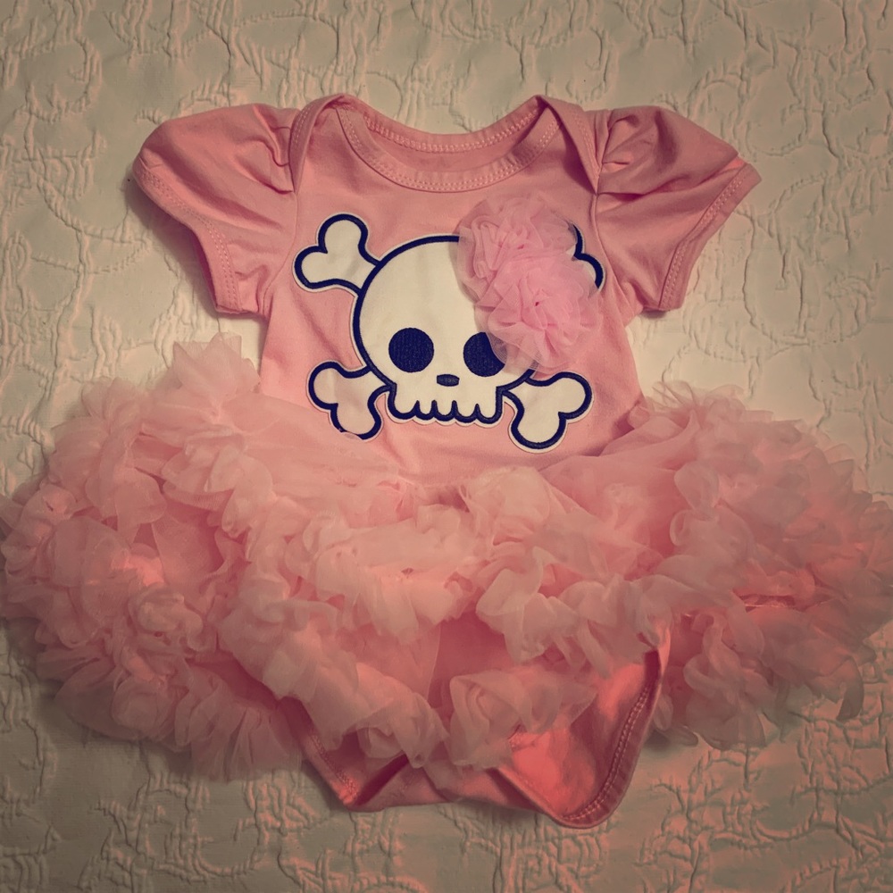Pink skull onesie